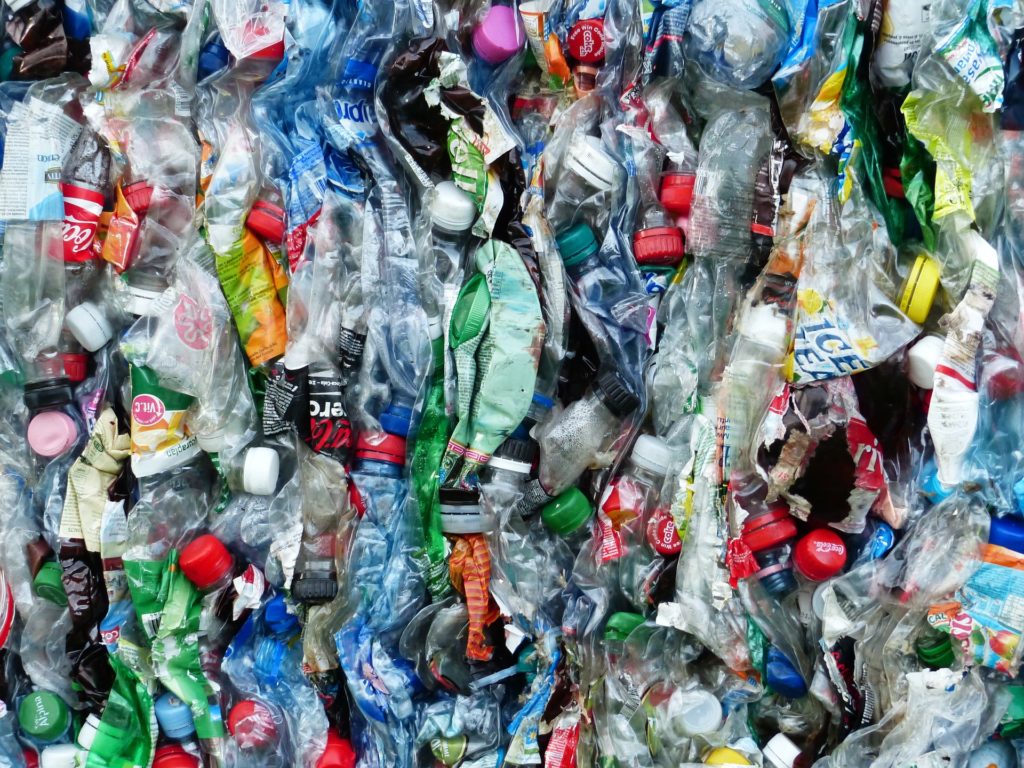 Image of plastic waste tightly packed together.